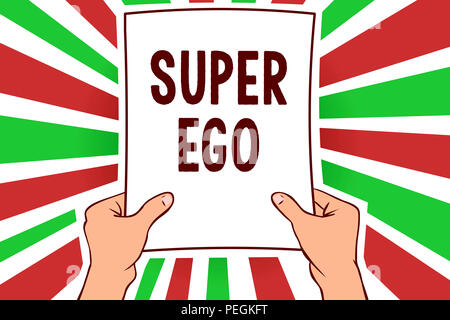 Writing note showing Super Ego. Business photo showcasing The I or self of any person that is empowering his whole soul Man holding paper important me Stock Photo