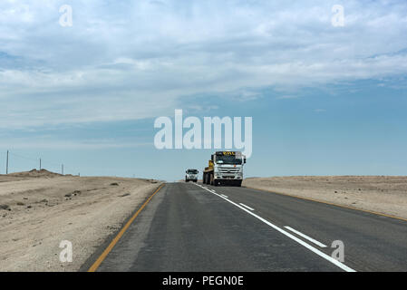 trucks on the road B2 east of Swakopmund, Namibia. Stock Photo