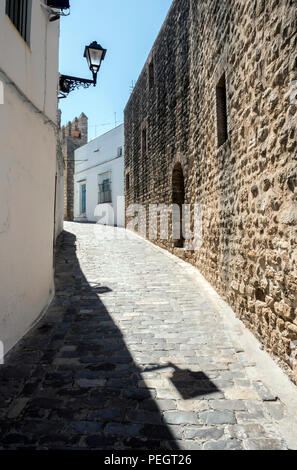 Whitewashed Andalusian typical house of white lime in Vejer de la Frontera, Cadiz, Spain Stock Photo