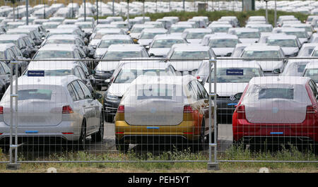 Schoenefeld, Germany. 15th Aug, 2018. Unauthorised Volkswagen vehicles are parked in a car park at BER Airport in Schoenefeld near Berlin, which has not yet been opened. VW has rented around 8,000 parking spaces in three multi-storey car parks and three open spaces at the terminal. Credit: Wolfgang Kumm/dpa/Alamy Live News Stock Photo