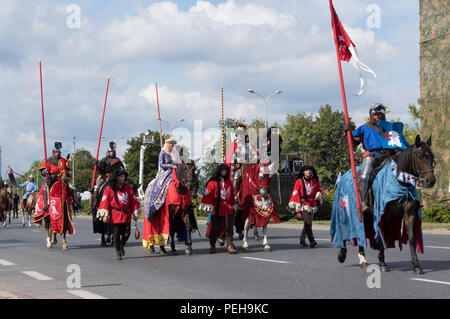 Poland, Warsaw: Re-enactors present uniforms and weapons from different periods of Polish military history at the annual military parade in the Poland's capital city. Stock Photo