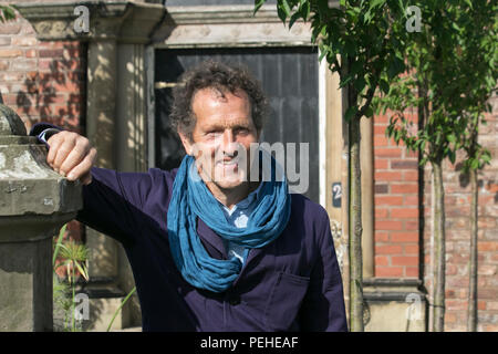 Monty Don greets visitors as he opens the Southport Flower Show, Merseyside, UK. Aug, 2018. Exhibitors, garden designers, gardening experts  and floral artists wow the visitors to this famous annual event. Stock Photo