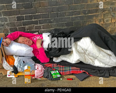 Rough sleeping homeless person, under a railway arch, Manchester, North West England, UK Stock Photo