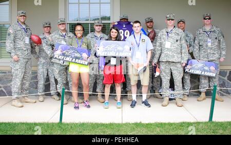 US Army Recruiting Command-Baltimore Battalion Recruiters and Future Soldiers get autographs from Baltimore Ravens players and coaches at the Under Armour Training Facility in Owings Mills, Md. Stock Photo