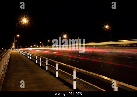 Car light trails over the Narrows Bridge in Perth City Stock Photo