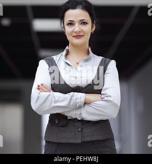 young employee standing in the hallway of the office. Stock Photo