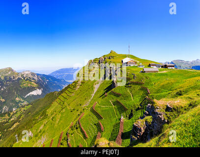 Maennlichen cable car station above Wengen and the Lauterbrunnen Valley, Jungfrau region and path to the Royal View, Bernese Oberland, Switzerland Stock Photo