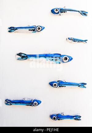 Ceramic fish on the wall of a building in Positano Stock Photo