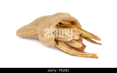 dried Liquorice roots on a white background Stock Photo