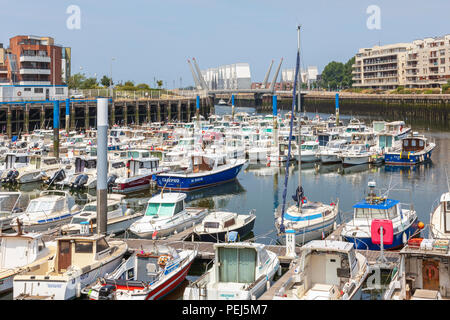 Local fleet of small boats in Dunkirk harbour, Dunkirk, France Stock Photo