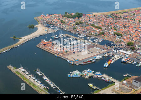 Aerial view Dutch fishing village with harbor and residential area Stock Photo