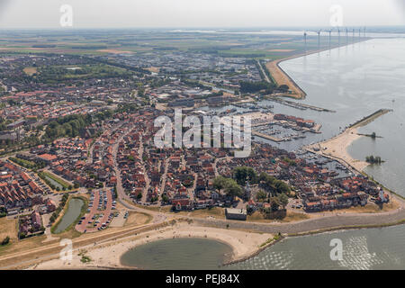 Aerial view Dutch fishing village with harbor and residential area Stock Photo