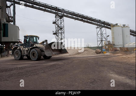 Aggregate is processed to separate and collect the finer material as a process of cement making at whitwell quarry, derbyshire uk. Stock Photo