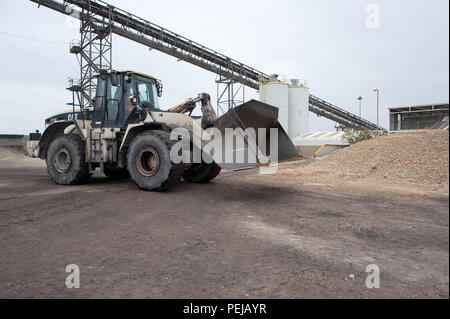 Aggregate is processed to separate and collect the finer material as a process of cement making at whitwell quarry, derbyshire uk. Stock Photo