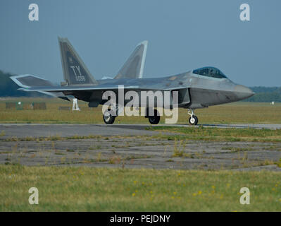 A U.S. Air Force F-22 Raptor taxis on the flight line at Lask Air Base, Poland, Aug. 31, 2015. The F-22s have previously deployed to both the Pacific and Southwest Asia for Airmen to train in a realistic environment while testing partner nations' ability to host an advanced aircraft like the F-22.  The F-22s are deployed from the 95th Fighter Squadron at Tyndall Air Force Base, Florida. The U.S. Air Force routinely deploys aircraft and Airmen to Europe for training and exercises. (U.S. Air Force photo by Staff Sgt. Joe W. McFadden/Released) Stock Photo