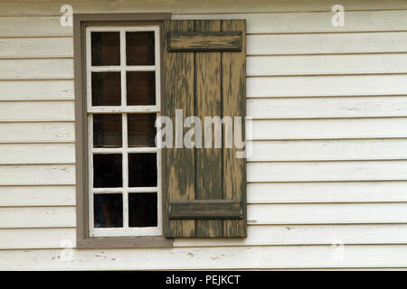 Window and shutter in Colonial Williamsburg, Virginia, USA Stock Photo