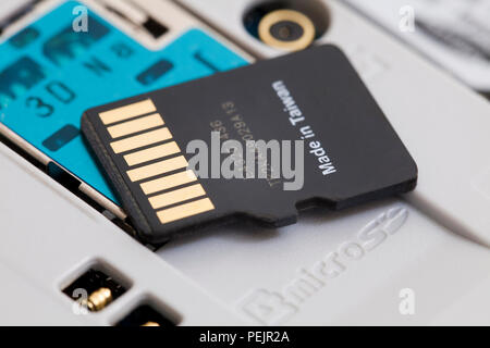 32 GB micro SD memory card removed from smart phone Stock Photo