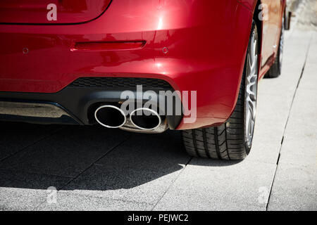 Exhaust pipe of sport's modern car Stock Photo