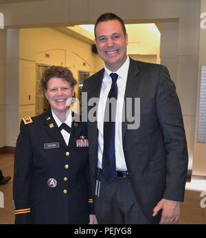 Col. Amy M. Taitano, former 650th Regional Support Group commanding officer, and Nic Danna, Office of Military Legal Assistance director, attended a press conference at the Grant Sawyer State Office Building, Las Vegas, and announced that a new office, the Office of Military Legal Assistance, was established to help veterans and their families Nov. 19.