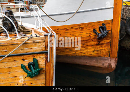 The bows and anchors of two veteran fishing boats in the port of Bergen, Norway. Fjordsteam 2018 Stock Photo