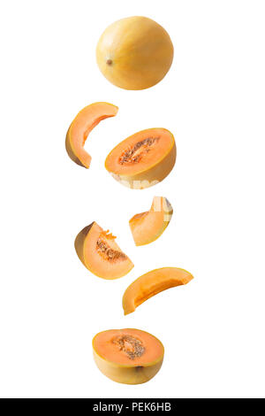 Isolated flying fruits. Falling melon isolated on white background with clipping path as package design element and advertising. Stock Photo