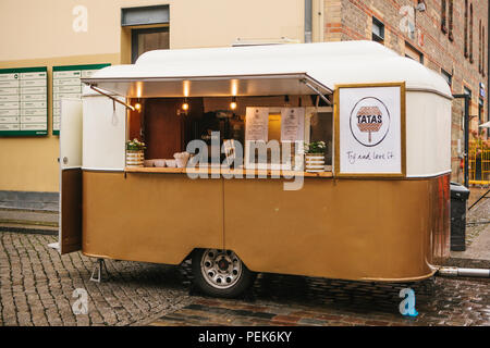 Berlin, October 1, 2017: Cozy small mini bus food market with snacks and coffee. Street Market Stock Photo