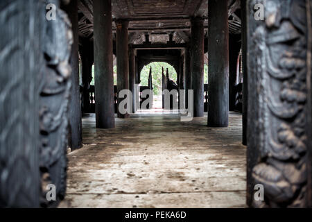 INWA (AVA), Myanmar — Bagaya Monastery (Bagaya Kyaung) was built in 1834 during the reign of King Bagyidaw. It is constructed entirely of teak, with 267 giant teak posts, the largest of which is 60 feet high and 9 feet in circumference. It is located in the old royal capital region of Inwa (Ava), not far from Mandalay. Stock Photo