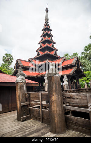 INWA (AVA), Myanmar — Bagaya Monastery (Bagaya Kyaung) was built in 1834 during the reign of King Bagyidaw. It is constructed entirely of teak, with 267 giant teak posts, the largest of which is 60 feet high and 9 feet in circumference. It is located in the old royal capital region of Inwa (Ava), not far from Mandalay. Stock Photo