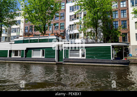 Floating houses in Amsterdam, Netherlands Stock Photo