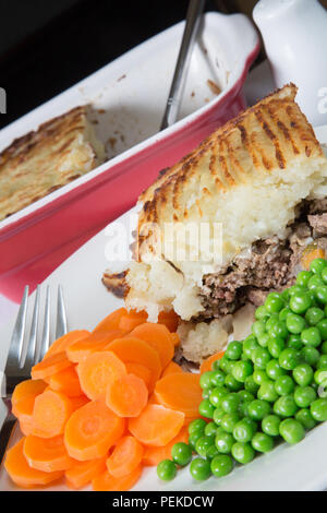 An English Pub Restaurant Meal Of Traditional Cottage Pie Served