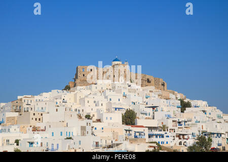 View of the castle sitting on top of the hill of Chora town in the island of Astypalea, Greece. Stock Photo