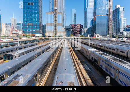 Trains in the Hudson Yards and Manhattan skyline Stock Photo