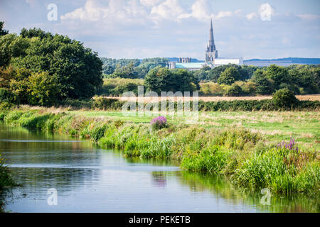 View of Chichester Cathedral from Poyntz Bridge, Hunston, West Sussex, England. This is the view painted by famous artist John Constable in 1831. Stock Photo