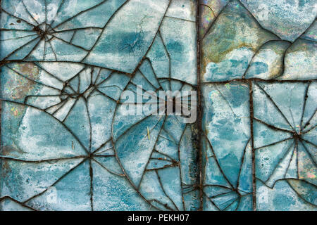 Patterns of broken glass tile on the wall Stock Photo
