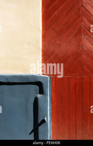 Fragment of wall with boards and shadow Stock Photo