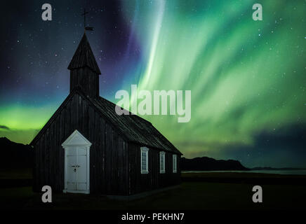 Budir Church Under the Aurora Borealis and Northern Lights On the Snaefellsnes Peninsula, Iceland Stock Photo