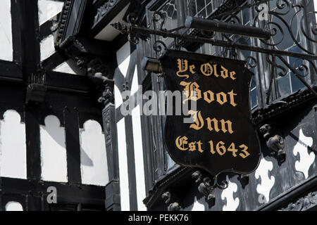 Ye Olde Boot Inn situated on the Rows in Eastgate Street in the historic city of Chester Stock Photo