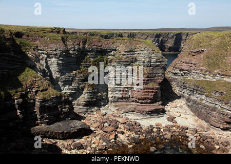 Geological strata from the Middle Devonian period in the rocks at Deerness, Orkney, Scotland Stock Photo