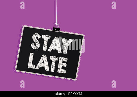 Text sign showing Stay Late. Conceptual photo A routine in which a person goes to somewhere out of time Hanging blackboard message communication infor Stock Photo