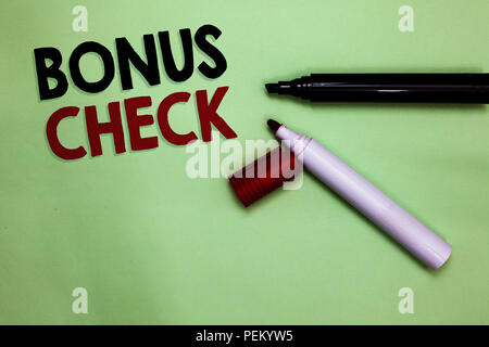 Text sign showing Bonus Check. Conceptual photo something in addition to what is expected or strictly due Open markers Inspiration communicating ideas Stock Photo