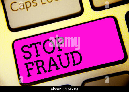 Text sign showing Stop Fraud. Conceptual photo campaign advices people to watch out thier money transactions Keyboard purple key Intention create comp Stock Photo