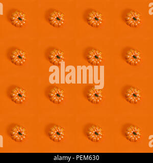 Happy Halloween! Seamless pattern with pumpkins on orange background Stock Photo