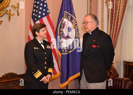 151216-N-ZZ999-902   WASHINGTON (Dec. 16, 2015) Chief of Navy Chaplains Rear Adm. Margaret Grun Kibben meets with the Rev. Patrick J. Conroy, S.J., chaplain for the House of Representatives, prior to delivering the opening prayer for the House session Dec. 16, 2015 in the U.S. Capitol in honor of the 240th Navy Chaplain Corps anniversary, Nov. 28. (U.S. Navy photo by Christianne M. Witten/Released) Stock Photo