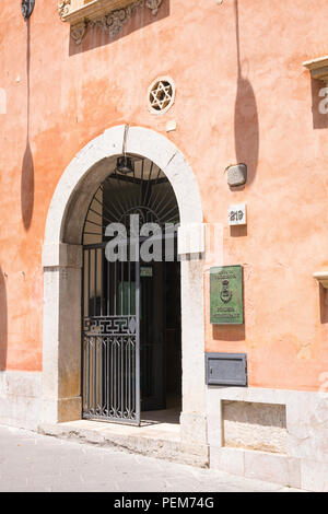 Italy Sicily Monte Tauro most famous luxury tourist resort Taormina old Synagogue Star of David in wall now Polizia Municipale city police Stock Photo
