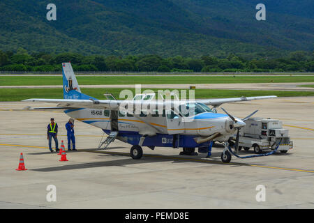 Chiang Mai, Thailand - Jun 22, 2016. A Kan Air Cessna 208B Grand Caravan taxiing on runway of Chiang Mai Airport (CNX). Stock Photo