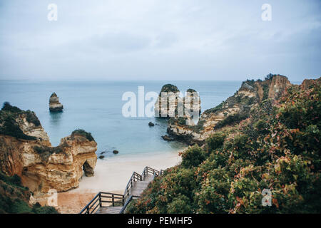 A staircase leading to the beach near the city of Lagos in Portugal. Stock Photo