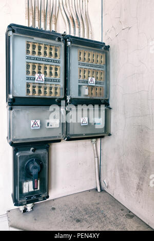 Old fuse box with fuses and main switch, ensure safety of the electricity Stock Photo