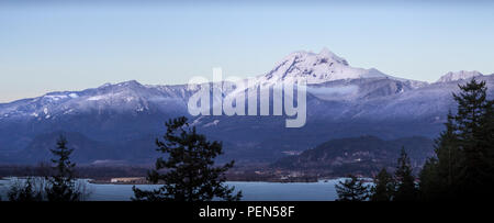 Snowy mountain peak near Squamish, BC, at dusk. Stock Photo