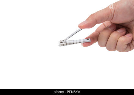 nail clipper in hand on white background. Stock Photo