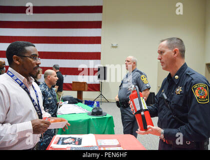 Navy Information Dominance Forces, Navy Network Warfare Command and Navy Cyber Defense Operations Command kicked off the holiday season Dec. 10, with a fall/winter safety fair to reiterate the importance for Sailors and civilian employees to make good decisions and to stay safe for the winter season.  More than 500 Sailors and civilian employees attended the event, which was organized by the command's safety office.  Various topics that were covered included: electrical and ladder safety, motorcycle safety, winterizing your car/safe driving on ice and snow, fire safety, stress management, ergo Stock Photo